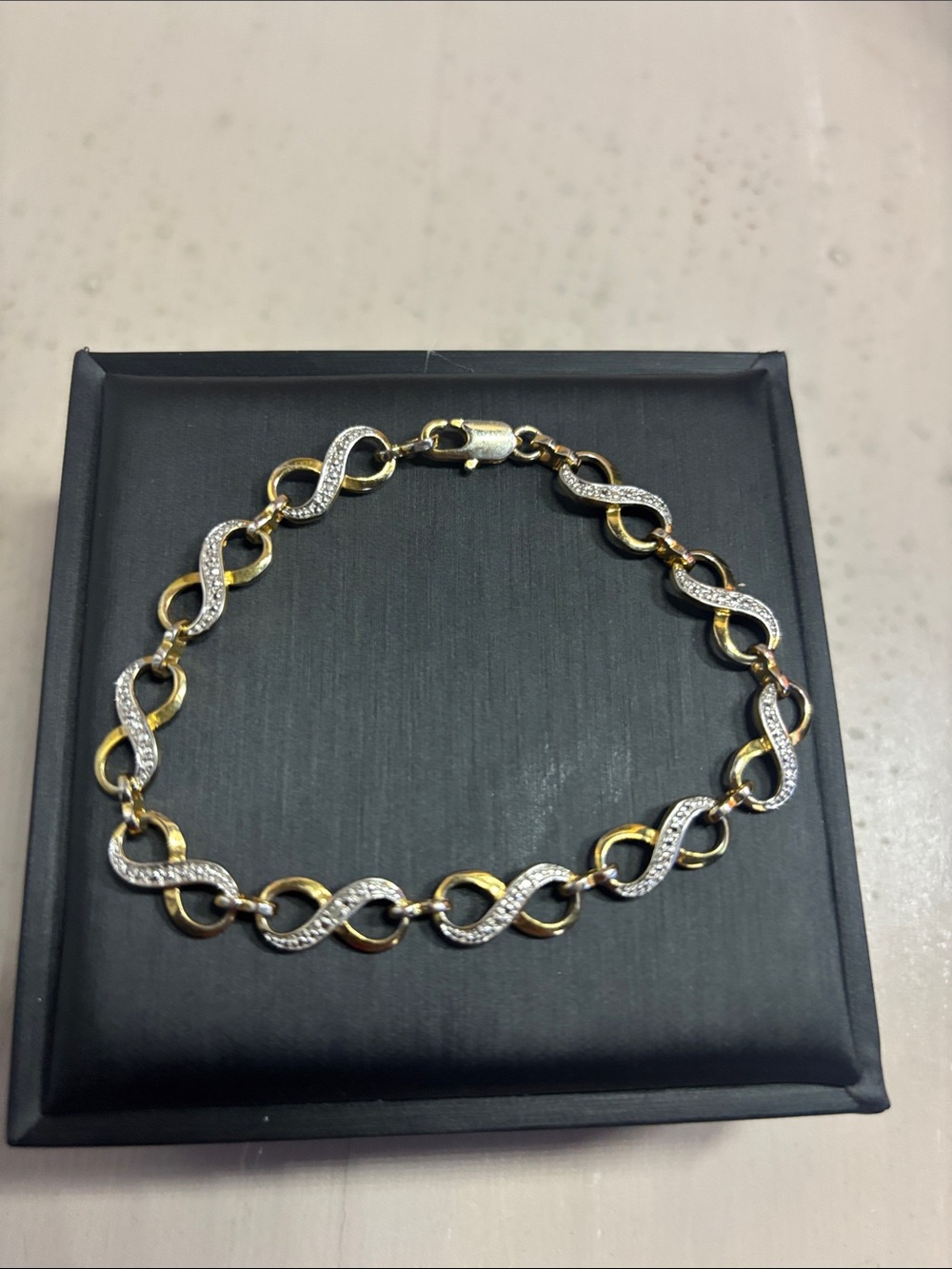 7.75” Gold and Silver Link Bracelet with Sparkling Accents